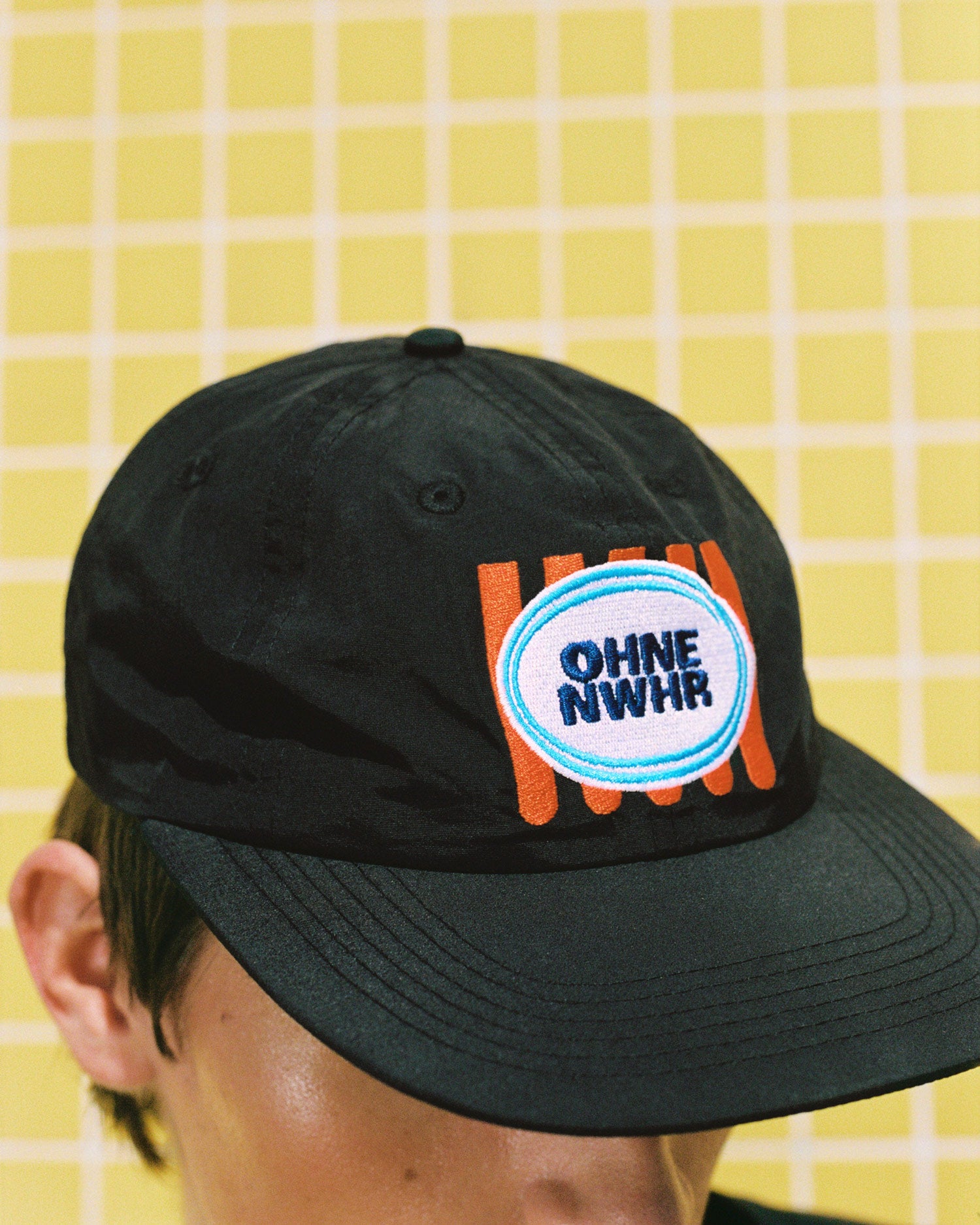 black snapback cap Ohne Project x Nowhere - side view