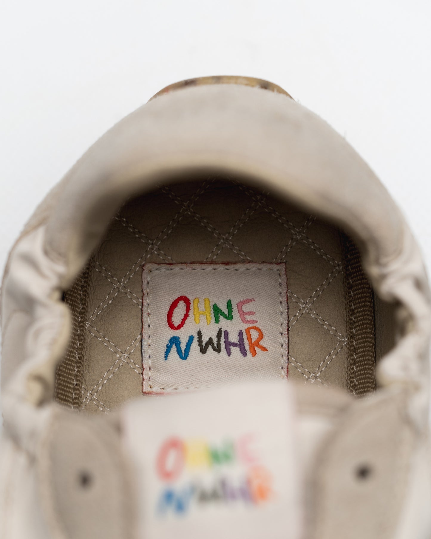 barefoot sneakerina kima Ohne Project x Nowhere - logo view