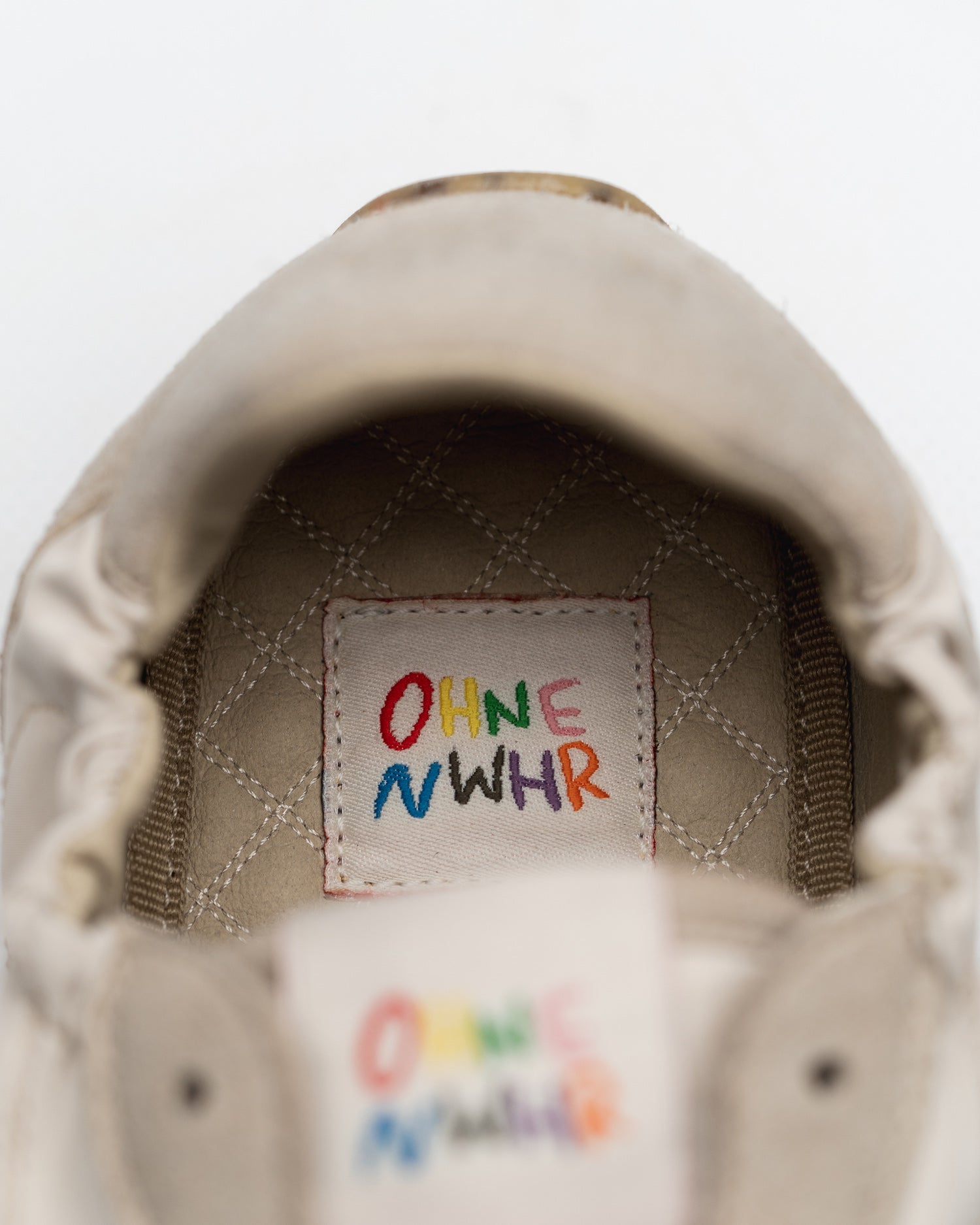 barefoot sneakerina kima Ohne Project x Nowhere - logo view